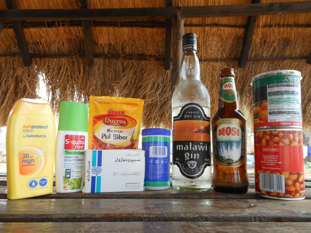 Left to right: UK sunscreen, German insect repellent, Turkish red pepper, Egyptian medicine for parasites, Kenyan herbs, Malawian gin, Zambian beer, South African beans, Swaziland jam