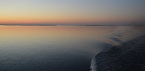 Sunset and wake on Lake Nasser